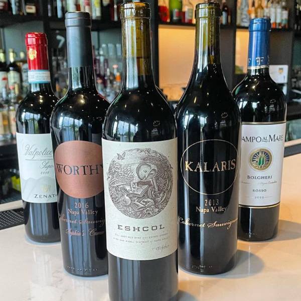 Assorted premium wine bottles at Galliano Italian Restaurant’s bar