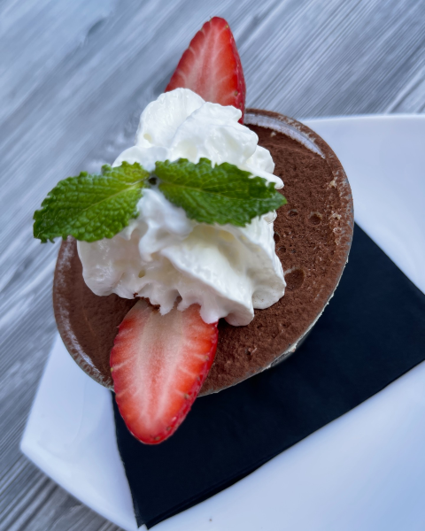 Tiramisu dessert with strawberries and whipped cream at Galliano Italian Restaurant Gambrills.