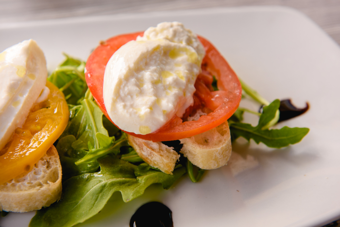 Fresh Italian antipasto with mozzarella and tomato.