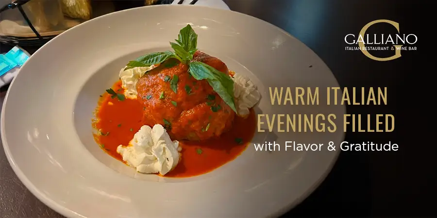 Italian dinner table with pasta, wine, and warm lighting at Galliano, Maple Lawn.